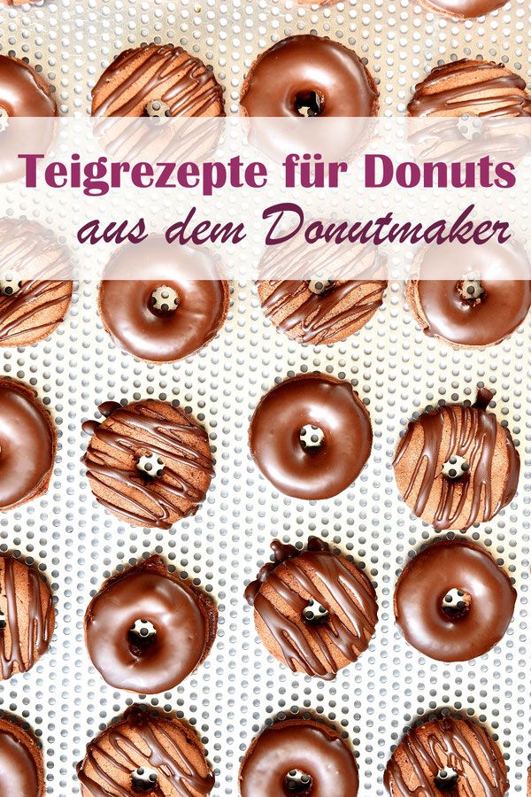 chocolate covered donuts sitting on top of a white tray with the words, teigerepe tilr donuts aus den donutker