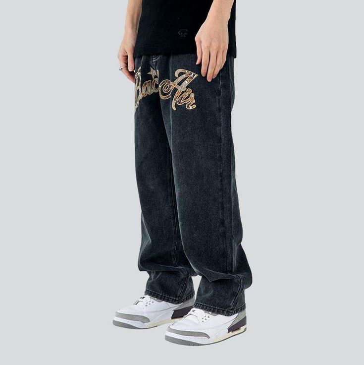 Elevate your urban style with the 2023 Autumn Collection of men's jeans with front inscriptions! These baggy. mid-waist jeans feature a stylish zipper and button closure. plus eye-catching stitched designs that will set you apart from the crowd. Let your individual style shine with these street-inspired jeans!Distinctive Features: Street Style: Stand out from the crowd with these street-inspired jeans. featuring eye-catching embroidered designs. Baggy Fit: Get a comfortable. casual fit with thes Denim Streetwear Bottoms With Letter Print, Denim Bottoms With Letter Print For Streetwear, Hip Hop Straight Leg Bottoms With Letter Print, Hip Hop Straight Leg Jeans For Streetwear, Urban Denim Jeans With Letter Print, Hip Hop Style Straight Leg Jeans With Five Pockets, Hip Hop Straight Leg Jeans With Five Pockets, Urban Black Jeans With Letter Print, Black Urban Jeans With Letter Print