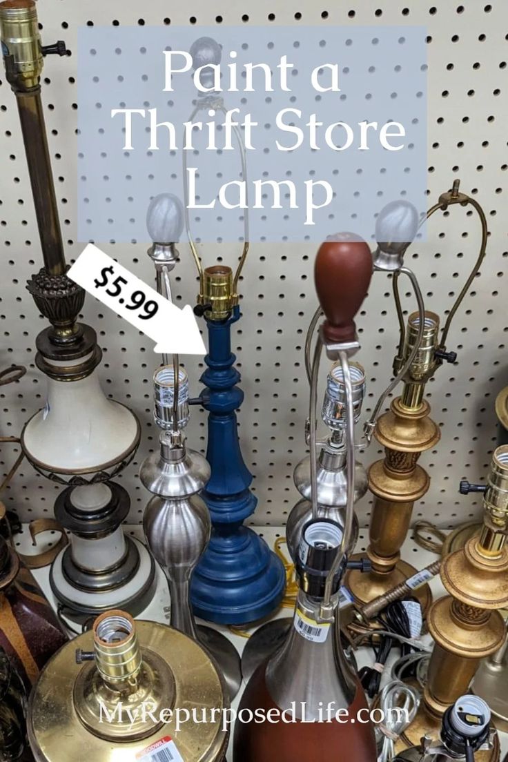 there are many different types of lamps on the shelf with this sign that says paint a thriftstore lamp $ 59 99