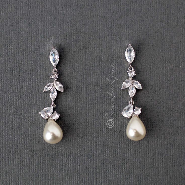 Teardrop Pearl Earrings Luxury Pearl Bridal Earrings For Pierced Ears, Luxury Sterling Silver Teardrop Bridal Earrings, Luxury Graceful Pearl Earrings For Anniversary, Cheap Elegant Teardrop Pearl Earrings, Affordable Teardrop Crystal Wedding Earrings, Cheap Glamorous Teardrop Earrings For Party, Elegant Cheap Crystal Bridal Earrings, Cheap Women's Teardrop Earrings For Anniversary, Luxury Wedding Pearl Earrings With Lever Back