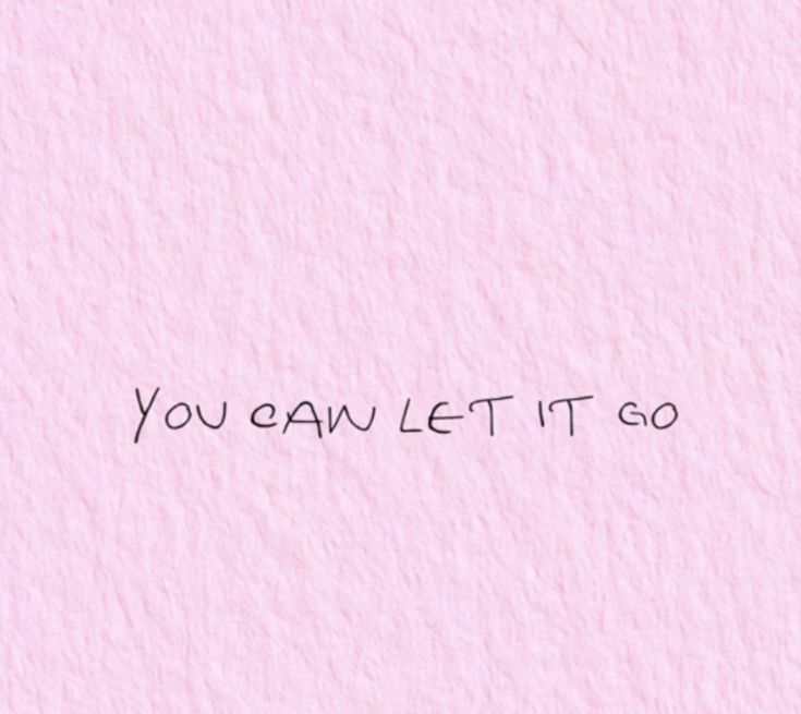 the words you can't let it go written on pink paper