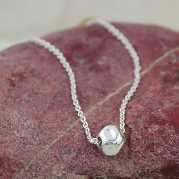 Mere Simplicity...Sterling silver and presented on a 16 inch chain.  If you prefer a longer length, you can select 18 or 20 inches for a small additional fee.  Sometimes it's the simple things that complete your look perfectly!Metal: .925 Sterling SilverFinish: High PolishClosure: Lobster Clasp MSRP: $39.99Part of the appeal of handcrafted sterling silver jewelry includes slight variations and irregularities in silversmith work.  These variations are not to be considered defects, but rather the Unique Sterling Silver Jewelry, Modern Silver Jewelry, Simple Silver Jewelry, Cleaning Silver Jewelry, Silver Rings With Stones, Hand Stamped Necklace, Fine Silver Jewelry, Cluster Necklace, Silver Jewelry Fashion