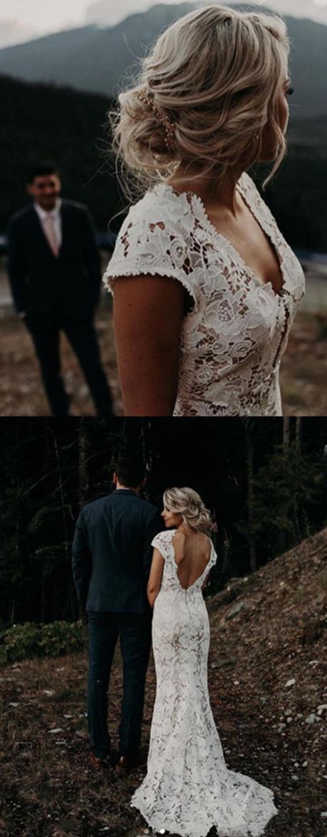 the bride and groom are posing for pictures in their wedding day outfits, with mountains in the background