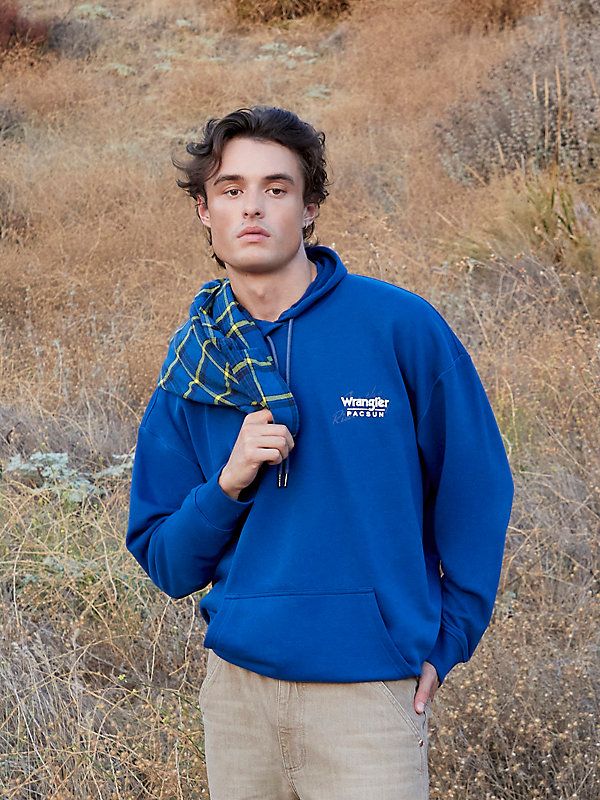 The Wrangler x PacSun Bucking USA Hoodie blends comfort with classic style. Featuring a drawstring hood, long sleeves with dropped shoulders, a kangaroo pocket, and a Wrangler x PacSun graphic at the left chest, it also boasts a Wrangler Jeans U.S.A. back graphic, and ribbed cuffs and hem for a snug fit. Usa Hoodie, Pacsun Mens, Wrangler Shirts, Wrangler Jeans, Men's Apparel, Men's Shirts, Graphic Hoodie, Graphic Hoodies, Pacsun