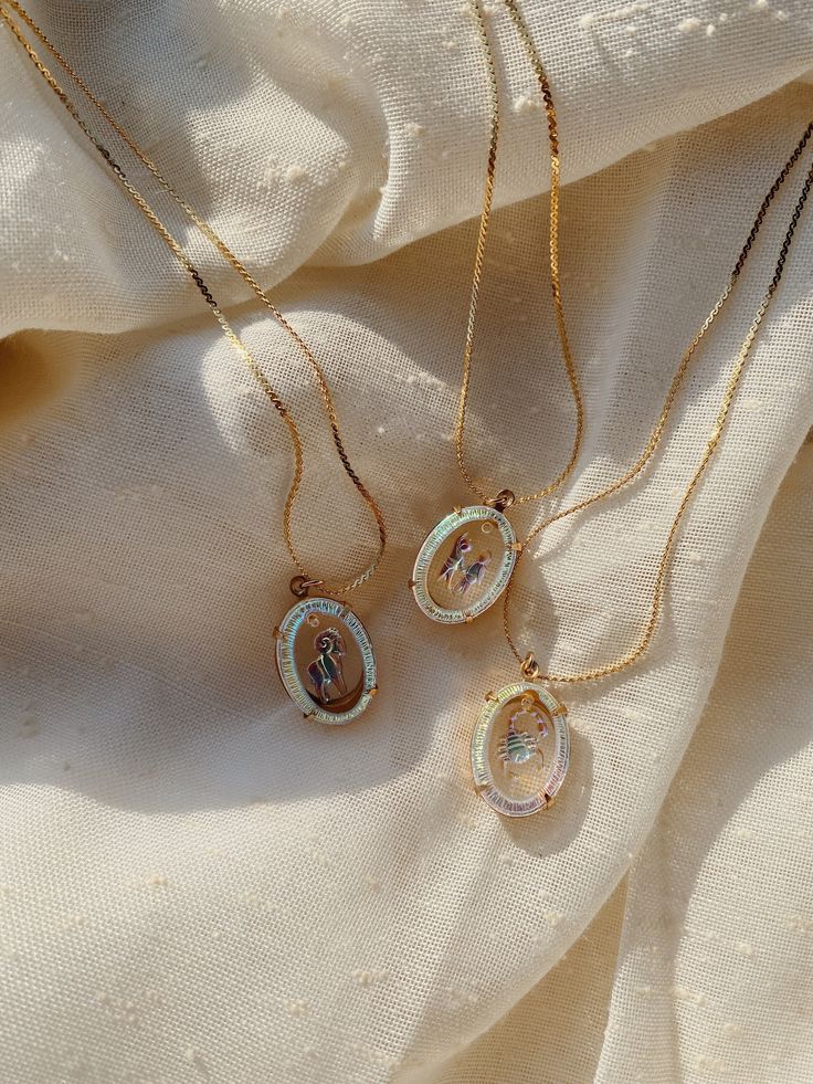 "Iridescent, holographic zodiac charms set in brass and hanging on a 18\" gold-plated serpentine chain Vintage glass pendants from Germany" Jeweled Shoes, Gold Glasses, Suspension Vintage, Gold Jewelry Simple, Neck Jewellery, Zodiac Necklaces, Jewelry Lookbook, Charm Set, Girly Jewelry