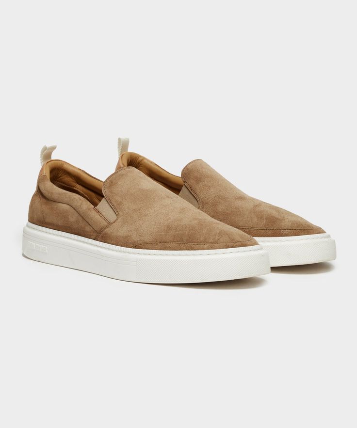 Todd was looking for something casual but cool that would be easy to slip on and off — a sneaker for running out to the office, or to grab a drink with friends — so he made one. This Slip-On Sneaker is crafted in Italy from luxe suede, and features a comfortable cork footbed and EVA sole. Versatile and laidback, they l Casual Custom Slip-on Sneakers With Contrast Sole, Slip-on Sneakers With Gum Sole, Casual Custom Slip-on Sneakers With Gum Sole, Casual Custom Slip-on Sneakers With Branded Insole, Comfortable Custom Slip-on Sneakers With Contrast Sole, Everyday Slip-on Sneakers With Stitched Sole, Casual Slip-ons With White Gum Sole, Modern Slip-on Sneakers For Everyday, Modern Everyday Slip-on Sneakers