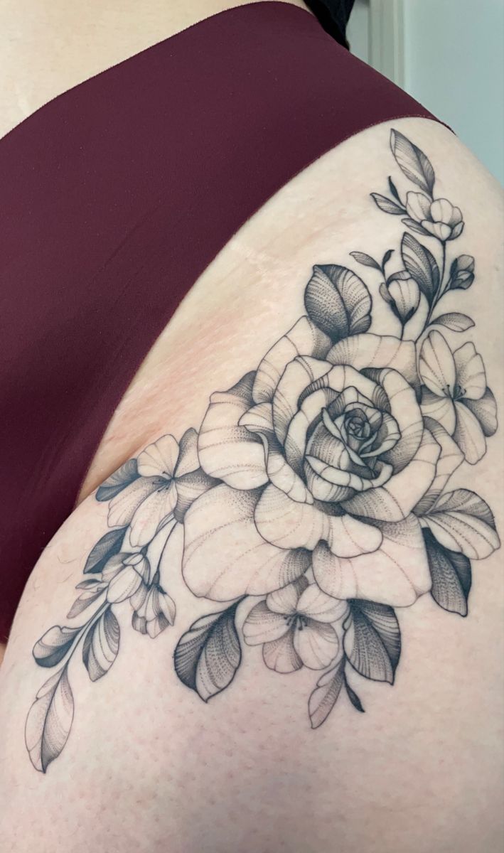 a woman's breast with flowers on it