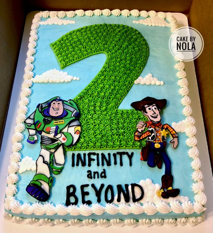 a birthday cake with the number two and characters from toy story book, buzz lightyear