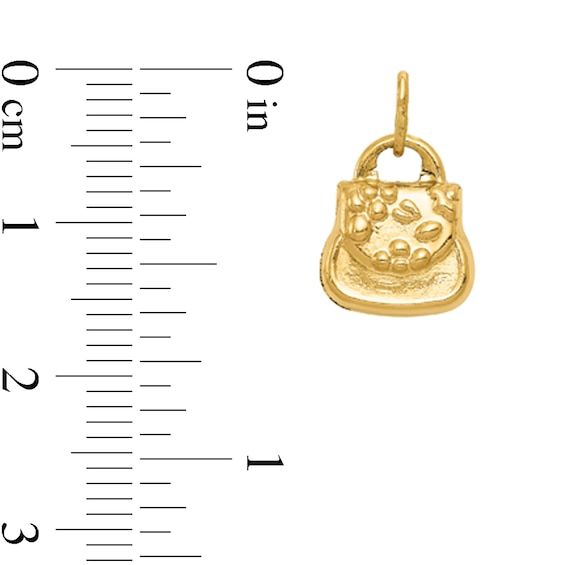 For your shopper, this polished and textured handbag charm is a fashion fave. Hollow 14K gold Top handle and flap detail 14.0 x 10.0mm This dainty charm is suitable for necklace and bracelet Chain sold separately Gold Jewelry With Removable Charms For Everyday, Gold Charms Jewelry As Fashion Accessory, Everyday Yellow Gold Charms, Elegant Everyday Jewelry With Charms, Elegant Gold Charms For Formal Occasions, Elegant Everyday Round Pendant Charms, Elegant Gold Plated Charms For Everyday, Elegant Everyday Pendant Charms, Elegant Yellow Gold Charm Necklace With Logo