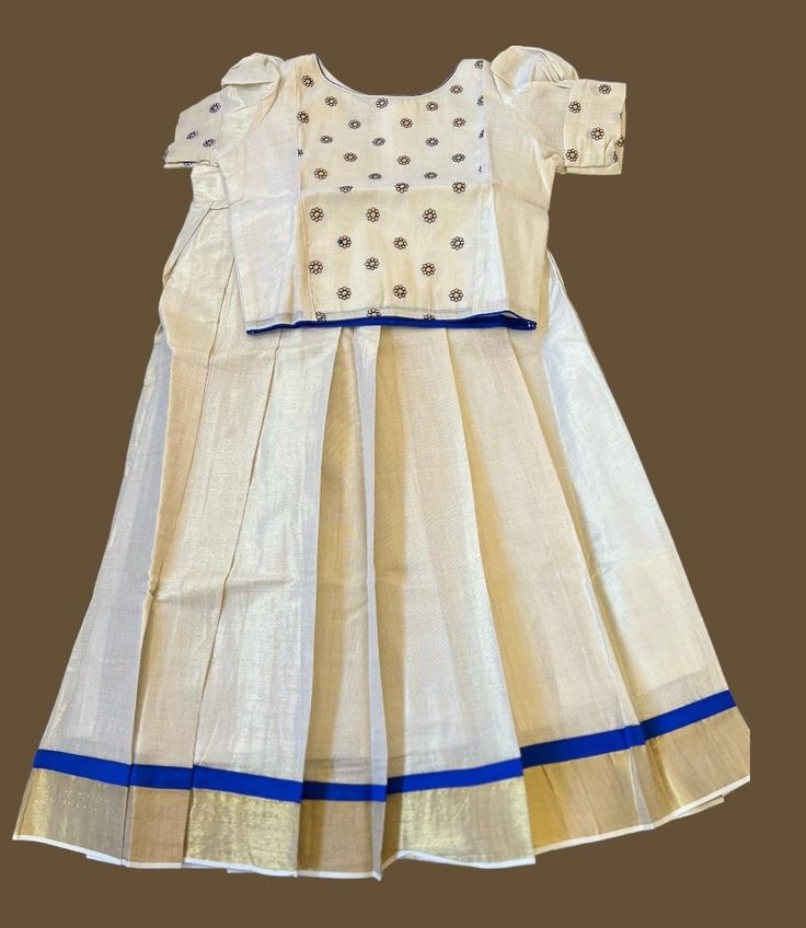 Tissue cotton lehenga /pattu pavada with cotton lining and embroidery thread work top. Available size-3T-4T(1set) Indian size:22 Available size-6T-7T(1set) Indian size:28 Cotton Sharara With Dori Work In Traditional Drape, Fitted Cotton Anarkali Set With Unstitched Blouse, Traditional Cotton Choli With Self Design, Cotton Choli With Traditional Drape, Festive Cotton Choli With Self Design, Festive Cotton Lehenga With Unstitched Blouse, Traditional Drape Cotton Choli With Self Design, Cotton Self Design Choli For Festivals, Cotton Sharara With Unstitched Blouse In Traditional Drape