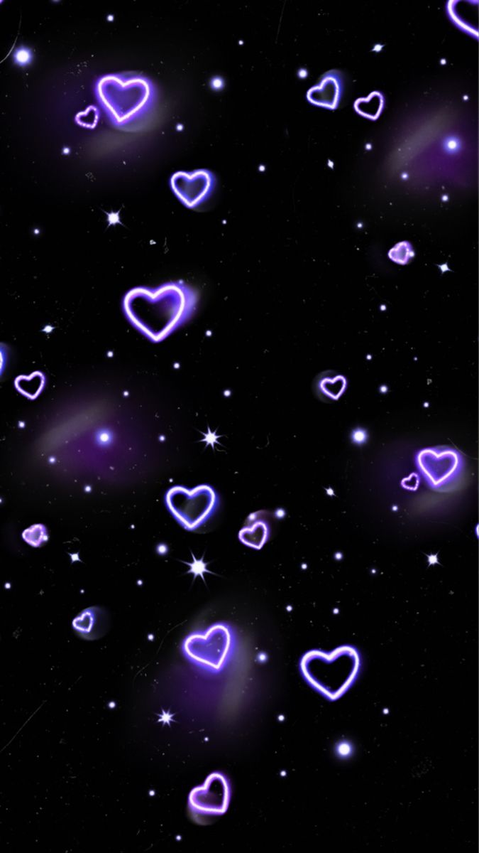 purple hearts floating in the air with stars and sparkles around them on a black background