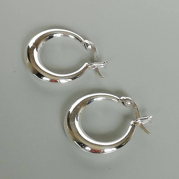 Crescent hoops | 18 mm silver hoops | Silver hoop earrings | Ear piercings | Minimalist hoops | Gypsy ear hoops | ENAL by TheSilverGame on Etsy Minimalistic Silver Jewelry, Ear Piercings Minimalist, Piercings Minimalist, Silver Ear Rings, Silver Earrings Aesthetic, Sliver Earrings, Hoops Silver, Earrings Hoops, Earring Silver