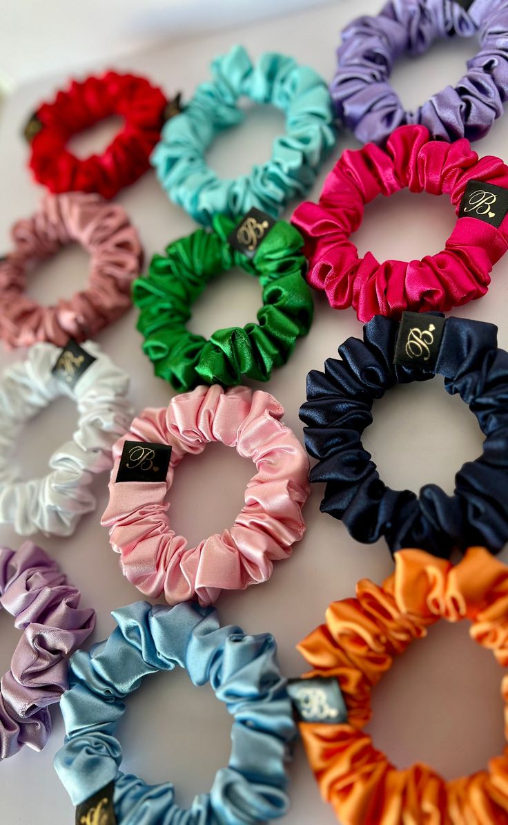 Luxury in Miniature: Premium Satin Mini Scrunchies Elevate your hair care routine with our Mini Satin Scrunchies, designed to bring a touch of elegance to your everyday style. Small but mighty, these silky-soft scrunchies are perfect for adding a chic, polished touch to any look while being gentle on your hair. Crafted from smooth satin, they protect your strands, reduce breakage, and ensure a secure yet comfortable hold for all-day wear. Whether you're accessorizing a half-up style, securing sm Mini Scrunchies, Structured Fabric, Wrist Accessories, Satin Scrunchies, Low Ponytail, Sleek Ponytail, Luxury Hair, Hair Elastics, Work Ideas