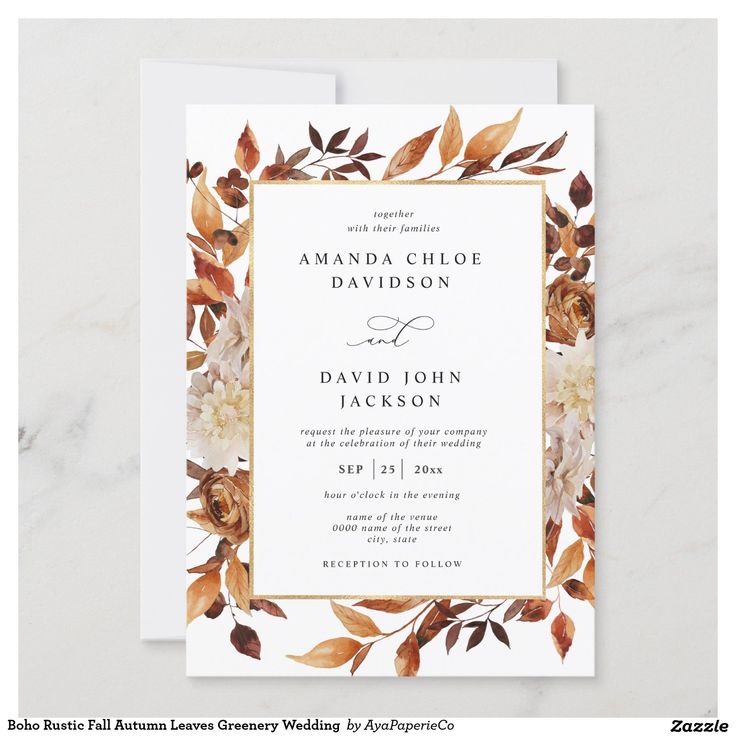 an elegant wedding card with watercolor flowers and leaves in gold foil on white paper