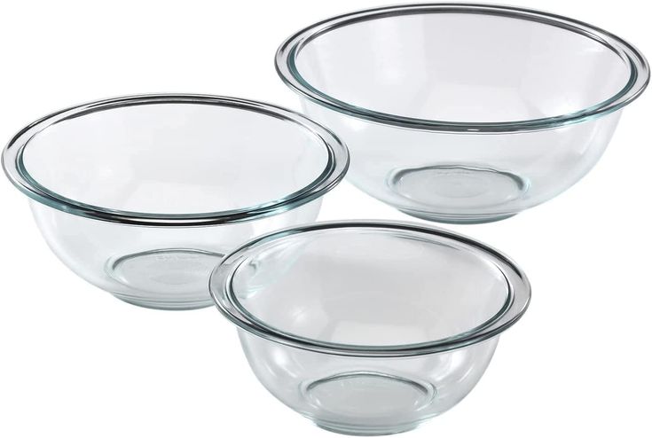 three clear glass bowls on a white background