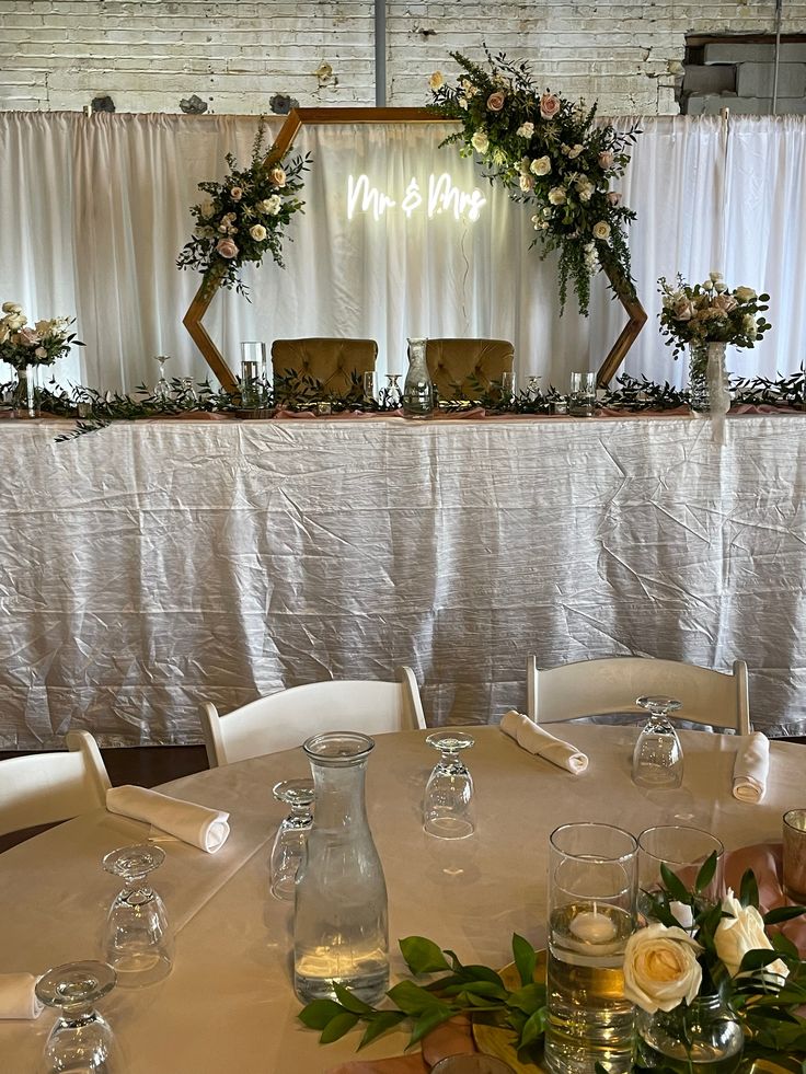 the table is set up for a wedding reception