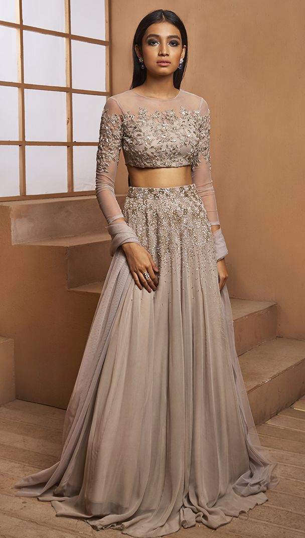 Grey embellished full sleeve blouse with a self embellished grey lehenga and plain net dupatta. Grey Lehenga, Orang India, Pengantin India, Desi Outfits, Indian Outfits Lehenga, Outfit Essentials, Lehnga Dress, Gaun Fashion, Indian Lehenga