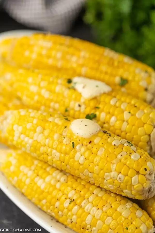 grilled corn on the cob with butter and parsley