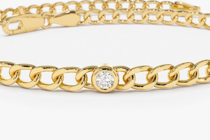 "Cuban Link Chain 14k Solid Gold / 3MM Cuban Curb Link Chain Bracelet with Bezel Setting Solitaire Diamonds by Ferkos Fine jewelry Item Details THREE STONES ✔ Made to Order ✔ Gold Kt: 14K Gold ✔ Width of Link: 3MM ✔ Round Diamond: 3 pcs 2.6MM ✔ Total CTW: 0.21 Ctw ✔ Diamond Color-Clarity: G Color Si Clarity ✔ Ready to Ship in 7-10 Business Days FIVE STONES ✔ Made to Order ✔ Gold Kt: 14K Gold ✔ Width of Link: 3MM ✔ Round Diamond: 5 pcs 2.6MM ✔ Total CTW: 0.35 Ctw ✔ Diamond Color-Clarity: G Color Yellow Gold Bracelets With Cable Chain, Diamond Cable Chain Bracelet In Yellow Gold, Classic Diamond Bracelet With Chain, Gold Diamond Chain Bracelet With Bezel Setting, Elegant Gold Chain Bracelet With Bezel Setting, Yellow Gold Chain Bracelet With Bezel Setting, Classic Gold Chain Bracelet With Bezel Setting, Fine Jewelry Round Chain Bracelet, Gold Chain Bracelet With Bezel Setting