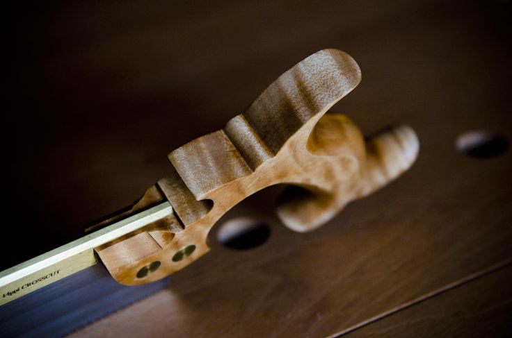 a close up of a wooden object on a table