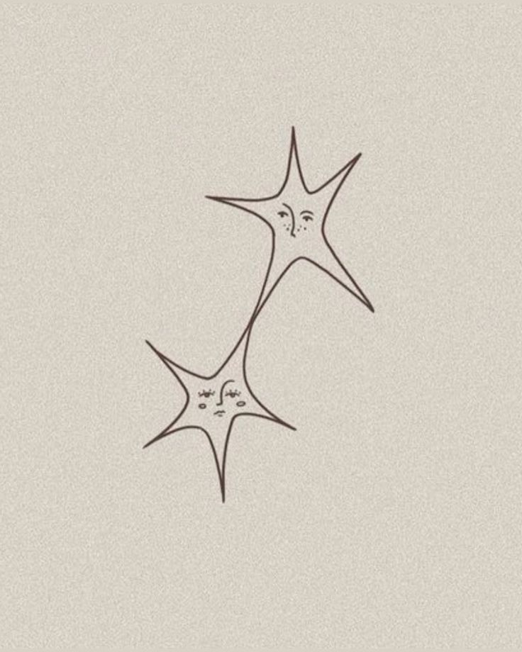 two stars with faces drawn on them