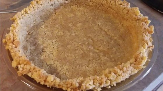 an uncooked pie sitting on top of a counter