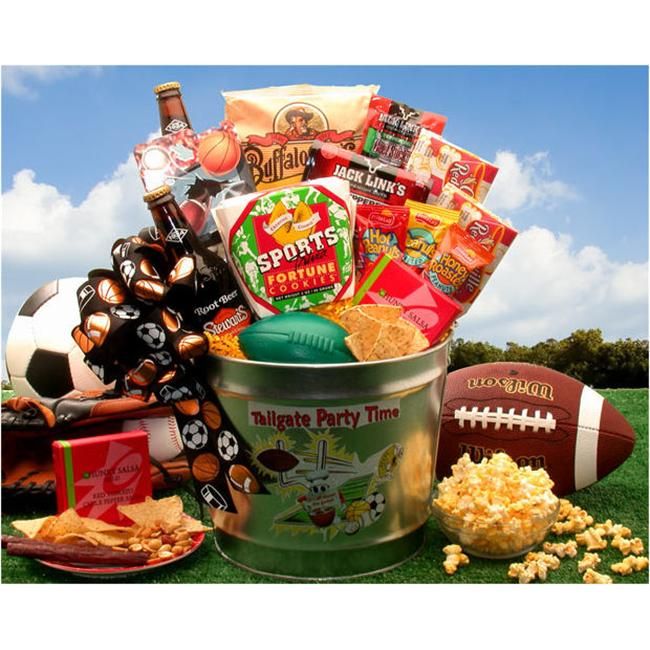 a football and snacks gift basket in a bucket on the grass next to a bowl of popcorn