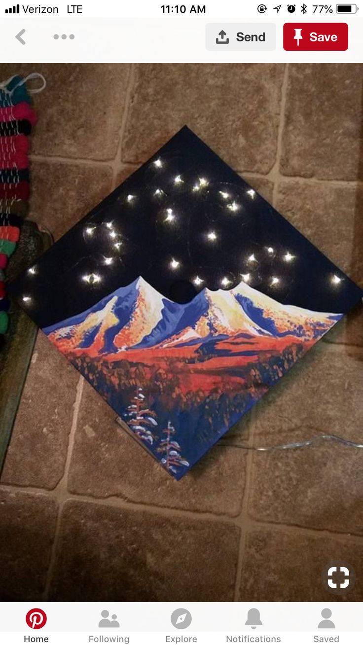 a decorated graduation cap with lights on it