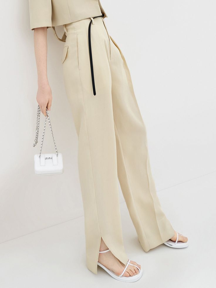 MO&Co. Women's Pleated Suit Pants with Belt Features : - Double side pockets- High waist, straight leg- Hook and button closure, side slit details Code: MBB2PAT017The back length of size M is cmMATERIALS & CARE Material: 76.9% Viscose 23.1% PolyesterSeparate mild machine wash below 30°CDo not bleach, hang to dryTumble dry low, low ironDo not soak, do not expose to the sunWash with neutral detergentNote: Remove accessories before washingOur sizes might be a little different from US/EU sizes. Plea Combination Outfit, Straight Suit, Pants With Belt, Fabric Photography, Tailored Clothes, Color Combinations For Clothes, Low Low, Straight Trousers, Colour Combination