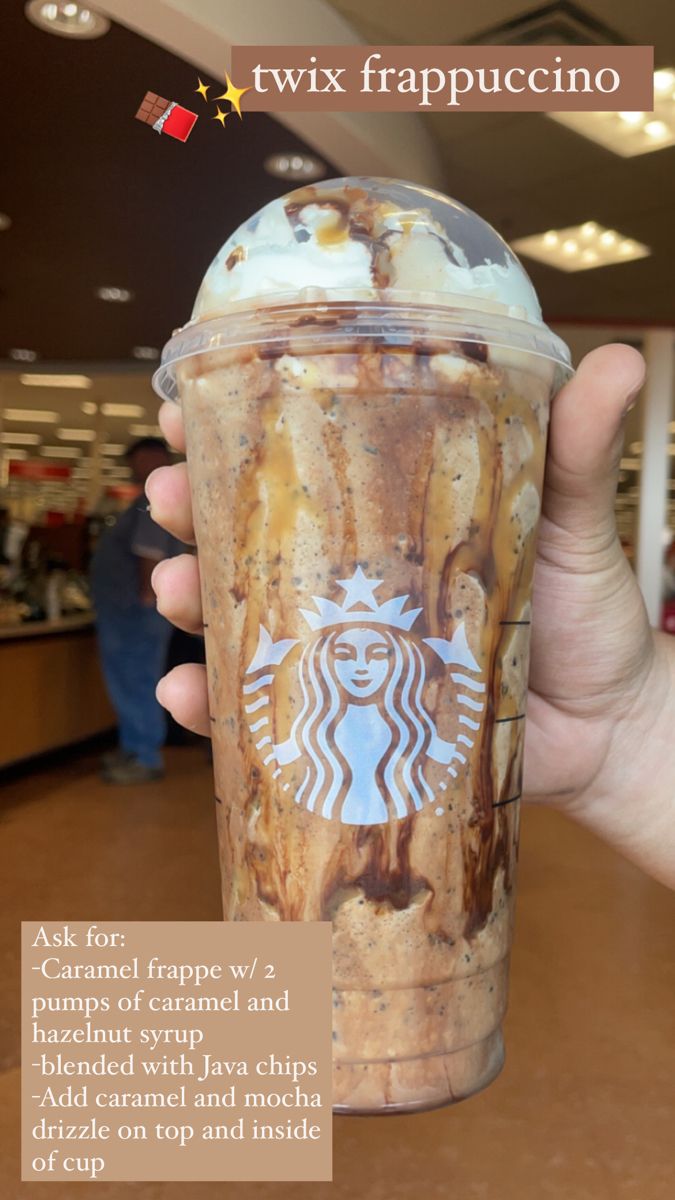 a person holding up a starbucks frappuccino drink