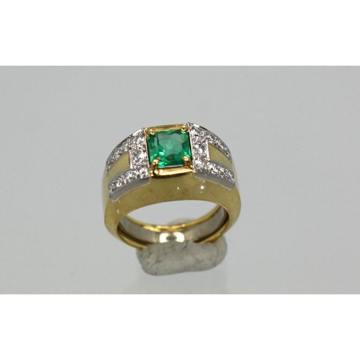 This is part of Chairish’s Fine Jewelry assortment.  This gorgeous David Webb Emerald and Diamond ring comes out of Paris and it is stunning. The ring features a gorgeous true Emerald Green Emerald square cut stone of approximately 1.25 to 1.50 carats and 18 Diamonds totaling approximately 0.90 carats. Metal: 18K Yellow Gold Weight: 13.8 Grams Stone: Square cut Emerald 1.25-1.50 Carats Stones:18 Diamonds .90 carats Size: 5-6 w/inner guard Dimensions: size 5-6.  This ring is double stamped Webb, Square Cut Diamond Emerald Ring, Square Cut Emerald Ring With Diamond, Luxury Emerald Rings With Diamond Cut, Luxury Yellow Gold Emerald Ring With Square Cut, Fine Jewelry Square Cut Emerald Ring For Anniversary, Luxury Emerald Rings With Accent Stones, Luxury Rectangular Emerald Ring With Center Stone, Luxury Emerald Ring In Rectangular Shape, Luxury Emerald Ring With Rectangular Shape