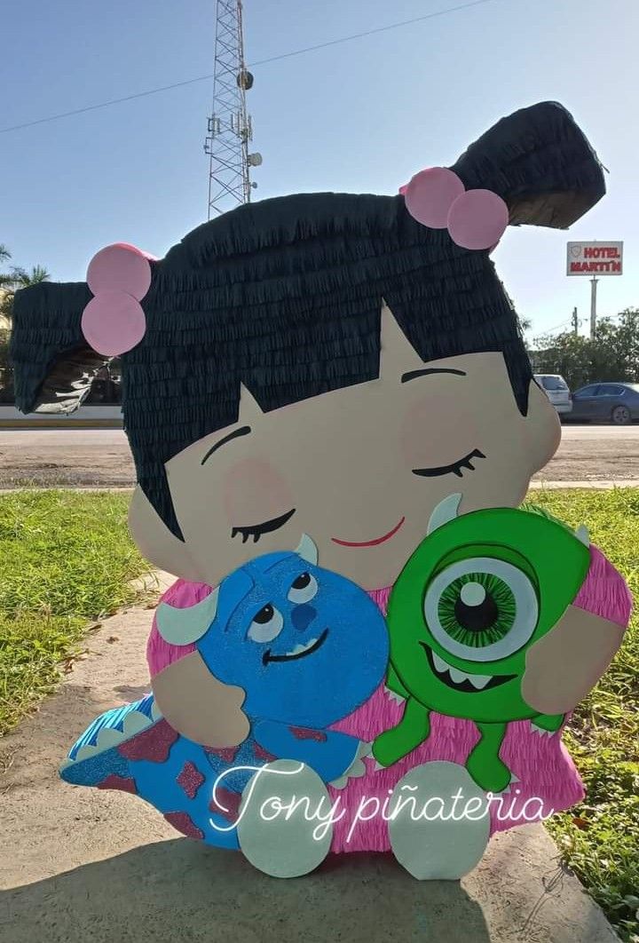 a paper cut out of a girl and monster hugging each other