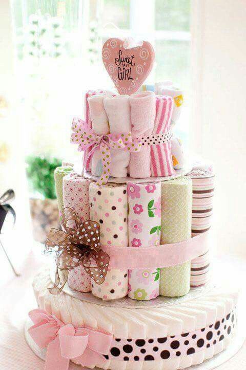 a stack of baby shower products on top of a table