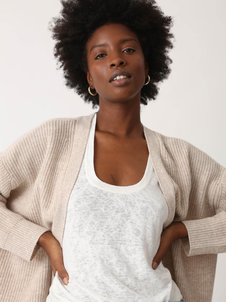 Our favorite slouchy cardigan in a luxuriously soft cashmere blend. The Everyday Cardigan features an oversized fit making it perfect for layering. You'll never want to take this one off. Fabric: 90% Wool, 10% Cashmere. Color-way: Oatmeal Heather. Model is 5'9" and wearing size small. Dry Clean Only. Versatile Cashmere Cardigan For Layering, Beige Cashmere Sweater Coat For Spring, Cozy Fine Knit Outerwear For Layering, Versatile Everyday Cashmere Outerwear, Oversized Neutral Sweater For Layering, Everyday Fine Knit Cashmere Outerwear, Versatile Everyday Cashmere Sweater, Everyday Versatile Cashmere Sweater, Relaxed Fit Fine Knit Outerwear For Layering