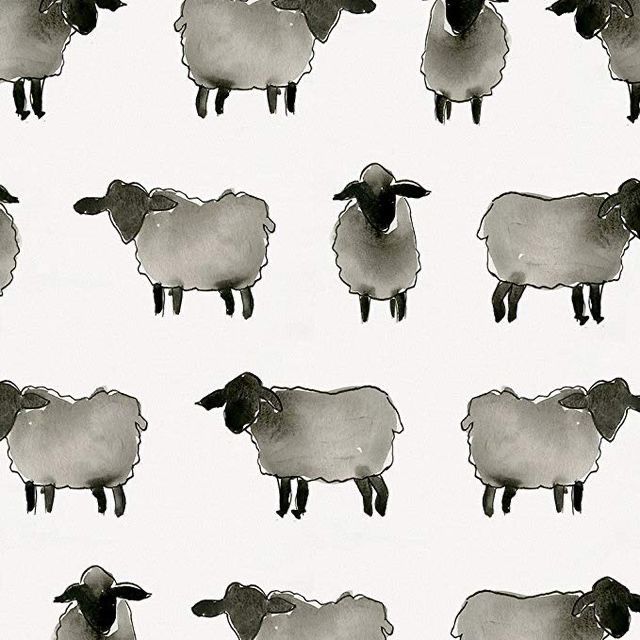 black and white sheep are standing in the same pattern as each other on a white background