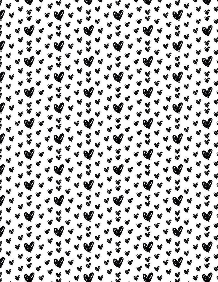 an abstract black and white pattern with hearts