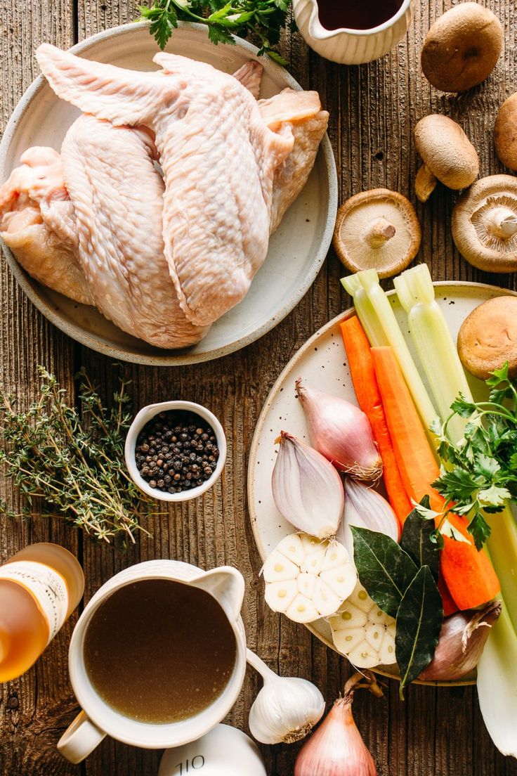 an assortment of vegetables and meats on plates