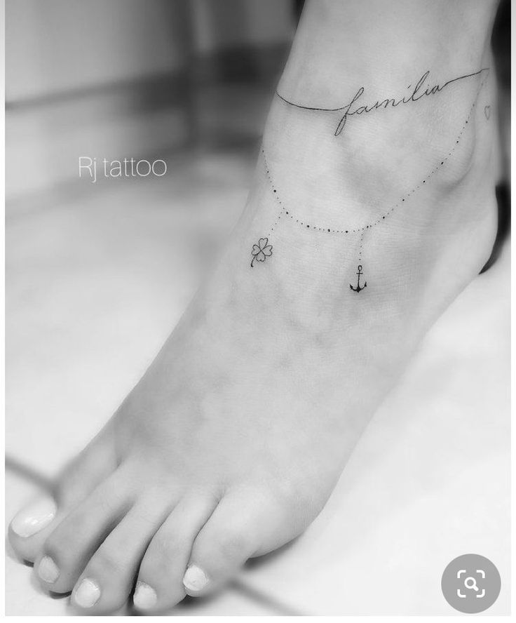 a woman's foot with a tattoo on it that says florida and an anchor