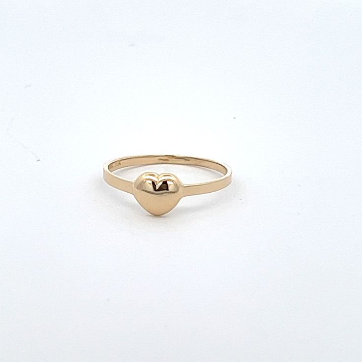 14k solid gold baby ring, ring size 4 stamped 14k gold.  Keepsake gift or midi, or pinky ring.  Model is 9 and wearing on her middle finger.  Puff heart design ring Celebrate with and wear to or gift for the following occasions or styles   :Baptisim :Christmas :Dedication :Birthday :Bridal Party :Midi :First knuckle :Above knuckle  :Daughters first ring Classic 14k Gold Heart Ring For Everyday, Hypoallergenic Yellow Gold Ring For Promise, Hypoallergenic Yellow Gold Promise Ring, Everyday Yellow Gold Heart Ring, Gold Heart Ring For Valentine's Day With Round Band, Stamped 14k Yellow Gold Rings For Valentine's Day, Stackable Yellow Gold Heart Ring As Gift, Classic 14k Gold Heart Ring As Gift, Heart Shaped 14k Gold Rings