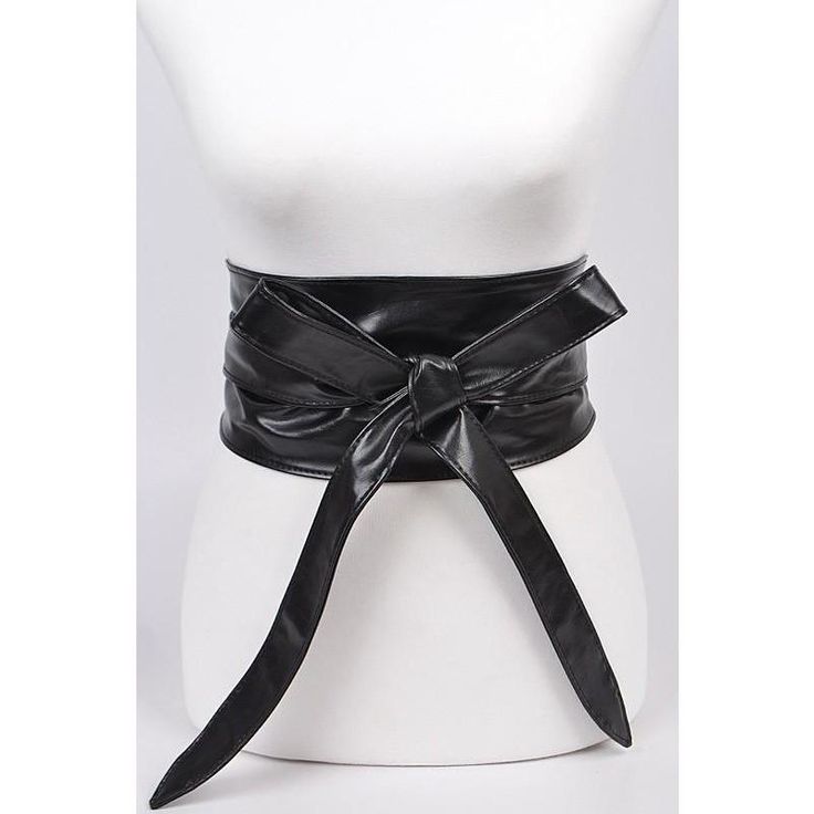 Tie front leather belt Wrap around Material: Polyurethane Approx Width: 5" Length: 104" Leather Party Belts, Black Leather Belt For Fall, Trendy Adjustable Faux Leather Belt, Chic Leather Corset Belt For Party, Elegant Faux Leather Corset Belt, Black Leather Corset Belt With Belt Loops, Black Leather Corset Belt For Evening, Elegant Leather Corset Belt For Fall, Black Fitted Modern Belt