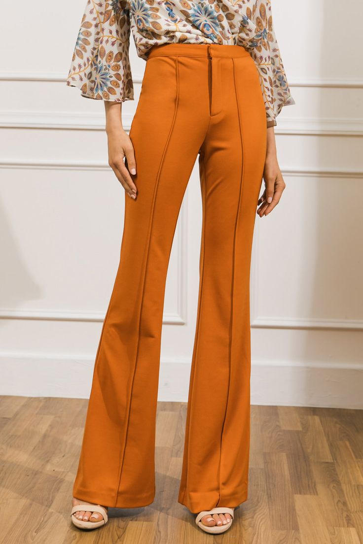 Our BUT BETTER FLARE PANTS offer a flattering fit with a classic center seam. The high rise silhouette creates a streamlined look, while faux back pockets add subtle flair. Enjoy a sleek, sophisticated style while staying comfortable and confident. Details Self: 97% polyester, 3% spandex Imported Size & Fit - Model is 5`8" and wearing size Small - Measurements taken from size Small - Length: 45" Pockets Details, Flying Tomato, Skirt Jumpsuit, Resort Collection, Stretch Pants, Swimsuit Cover, Sweatshirt Dress, Sophisticated Style