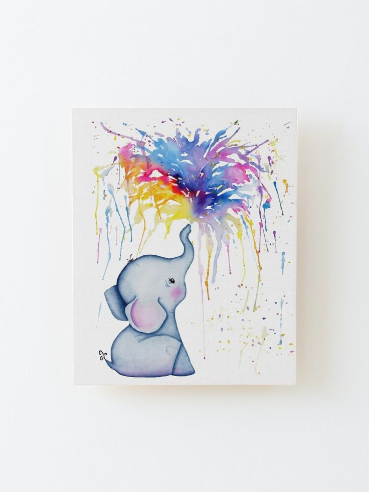 an elephant with colorful paint splatters on it's head is shown in front of a white background