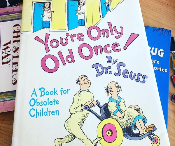 the children's book you're only old once by dr seuss is on display