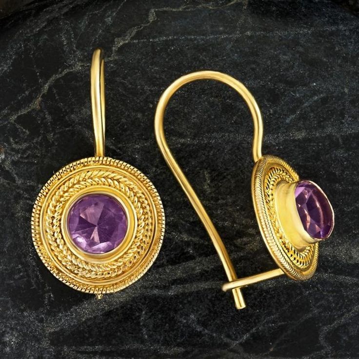 Handcrafted of a tiny disc of filigree thread, this classic Greek design highlights the beauty of a single amethysts are subtle yet undeniably brilliant. 24k gold over sterling silver; hinged backs. Size: 7/8 Inches. Ancient Greek Jewelry, Greek Design, Lapis Lazuli Earrings, Greek Jewelry, Leverback Earrings, Styl Boho, Geometric Pendant, Amethyst Earrings, Hand Made Jewelry