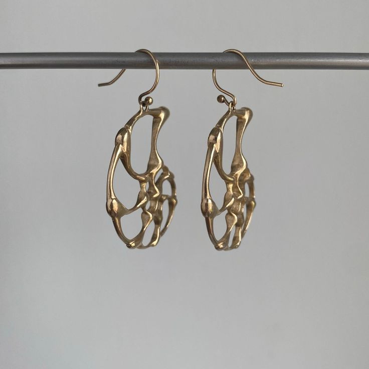 These nautical earrings give the feel of riding shining, golden waves. 14k yellow gold Ammonites measure 1" x 1 1/4" Earrings hang 1 7/16" from the ear Each earring weighs 4.1g 4 Earrings, Nautical Earrings, Newport Ri, Newport, Nautical, Fine Jewelry, Yellow Gold, Sculpture, Yellow