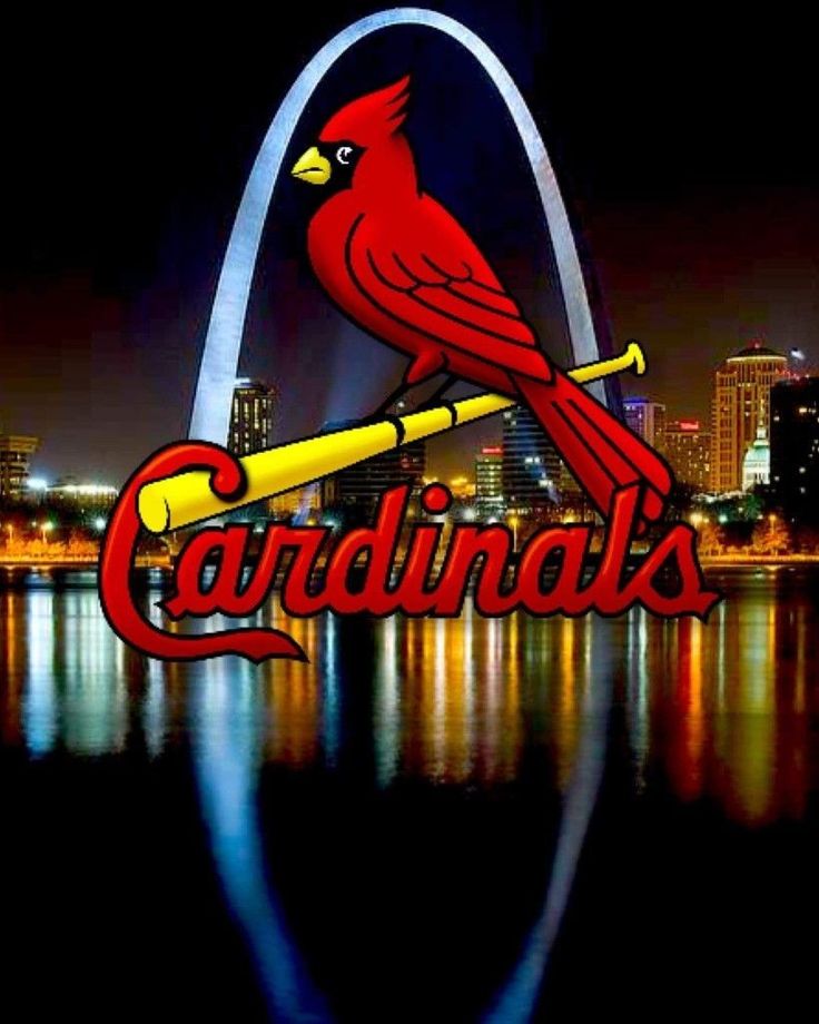 the st louis cardinals logo is lit up in front of the st louis arch at night