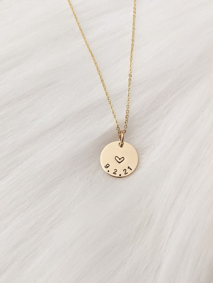 "Personalized date necklace, Disc necklace in 14k Gold Filled or Sterling Silver, Custom heart necklace, Anniversary jewelry, Wedding date, Christmas gift, New mom gift Carry your most special day with you wherever you go. Hand cut, stamped by hand and finished with love, this simple yet beautiful necklace will suit anyone. D E T A I L S * Gold Filled: Gold Filled Disc, Clasp and Chain. * Sterling: .925 Sterling Silver Disc, Clasp and Chain. P E N D A N T * 1/2\" disc * Photos show a Polished / Wedding Date Necklace, Anaversery Necklace, Custom Necklace Personalized Jewelry, New Mom Necklace, Anniversary Necklace For Her, Personalized Necklace Ideas, Personalized Necklace For Mom, New Mom Jewelry Ideas, Mother’s Day Jewelry Ideas