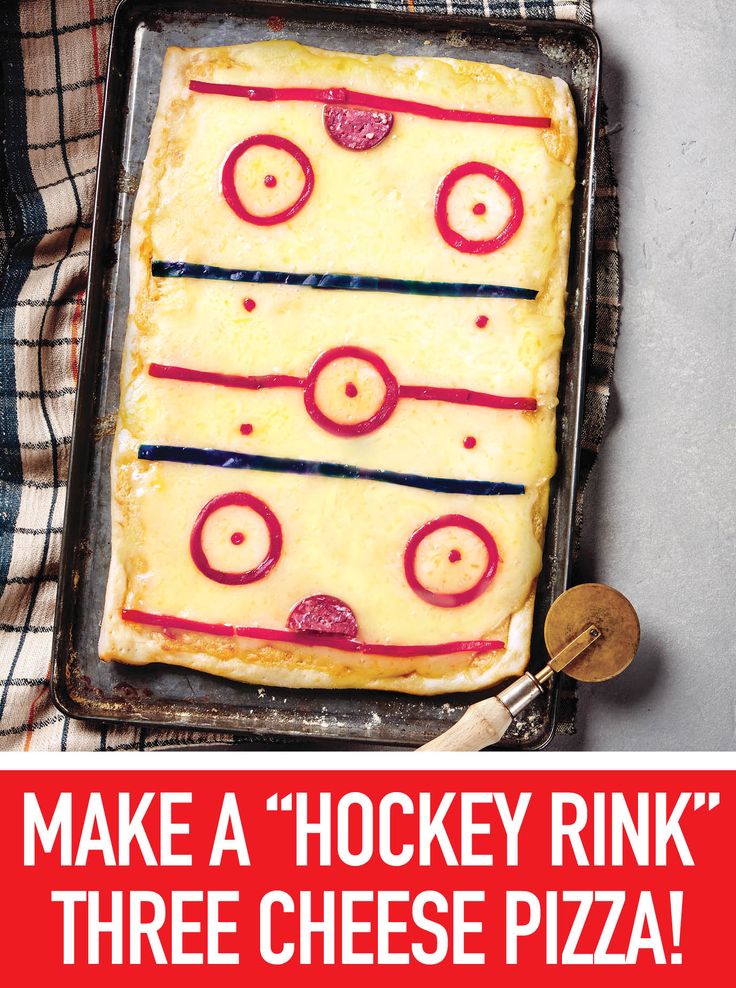 a square pizza sitting on top of a pan covered in cheese