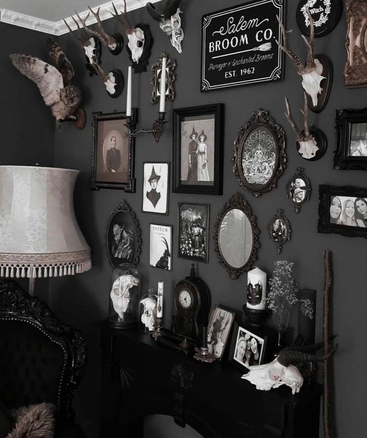 a black and white room with pictures on the wall