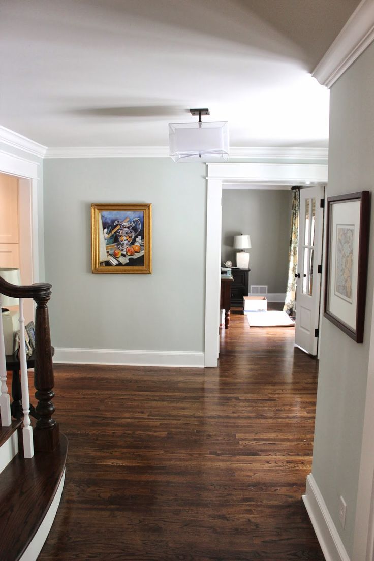 the hallway is clean and ready to be used as a living room or dining area